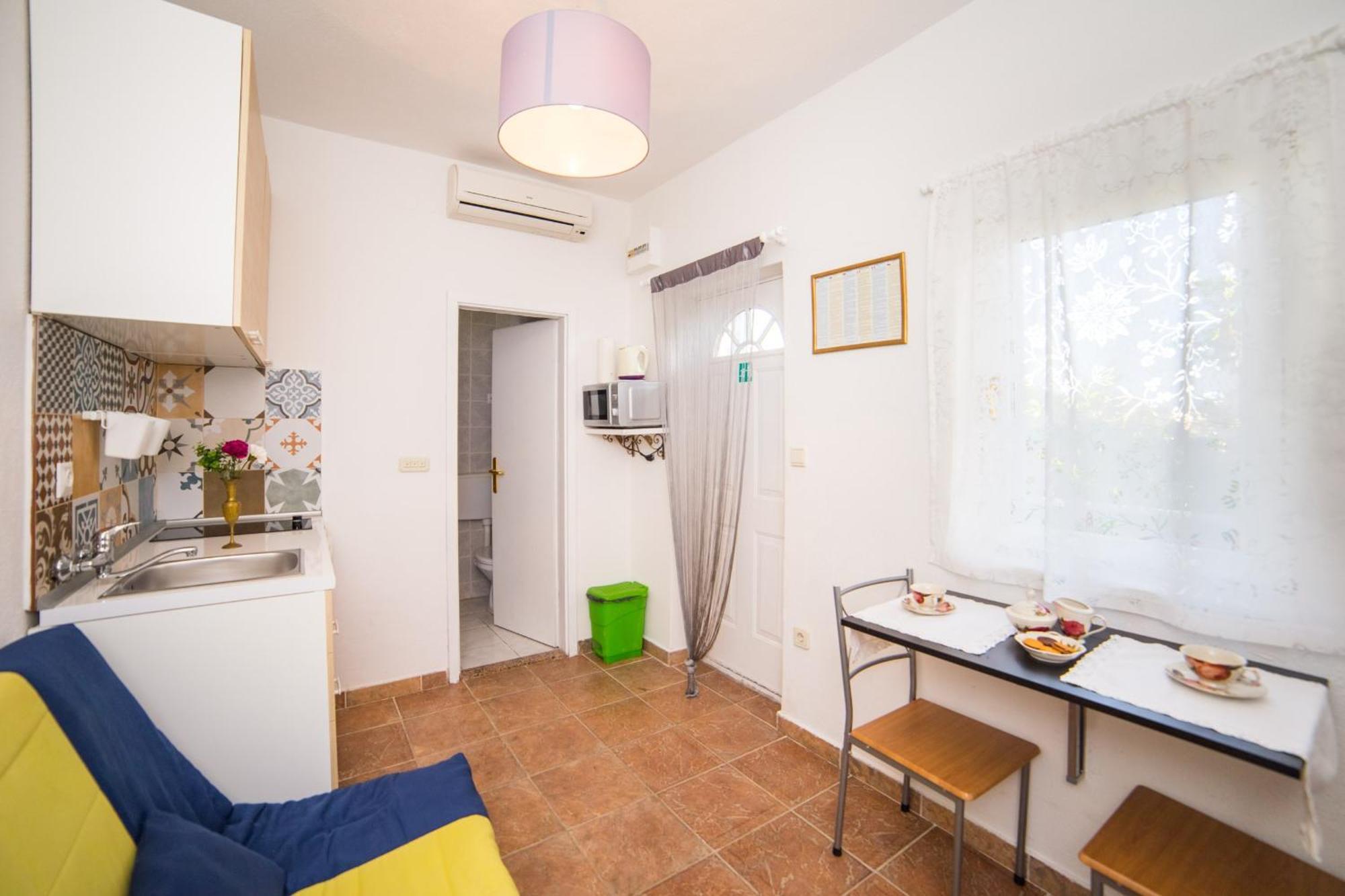 Apartmani Kala ポドゥゴラ 部屋 写真